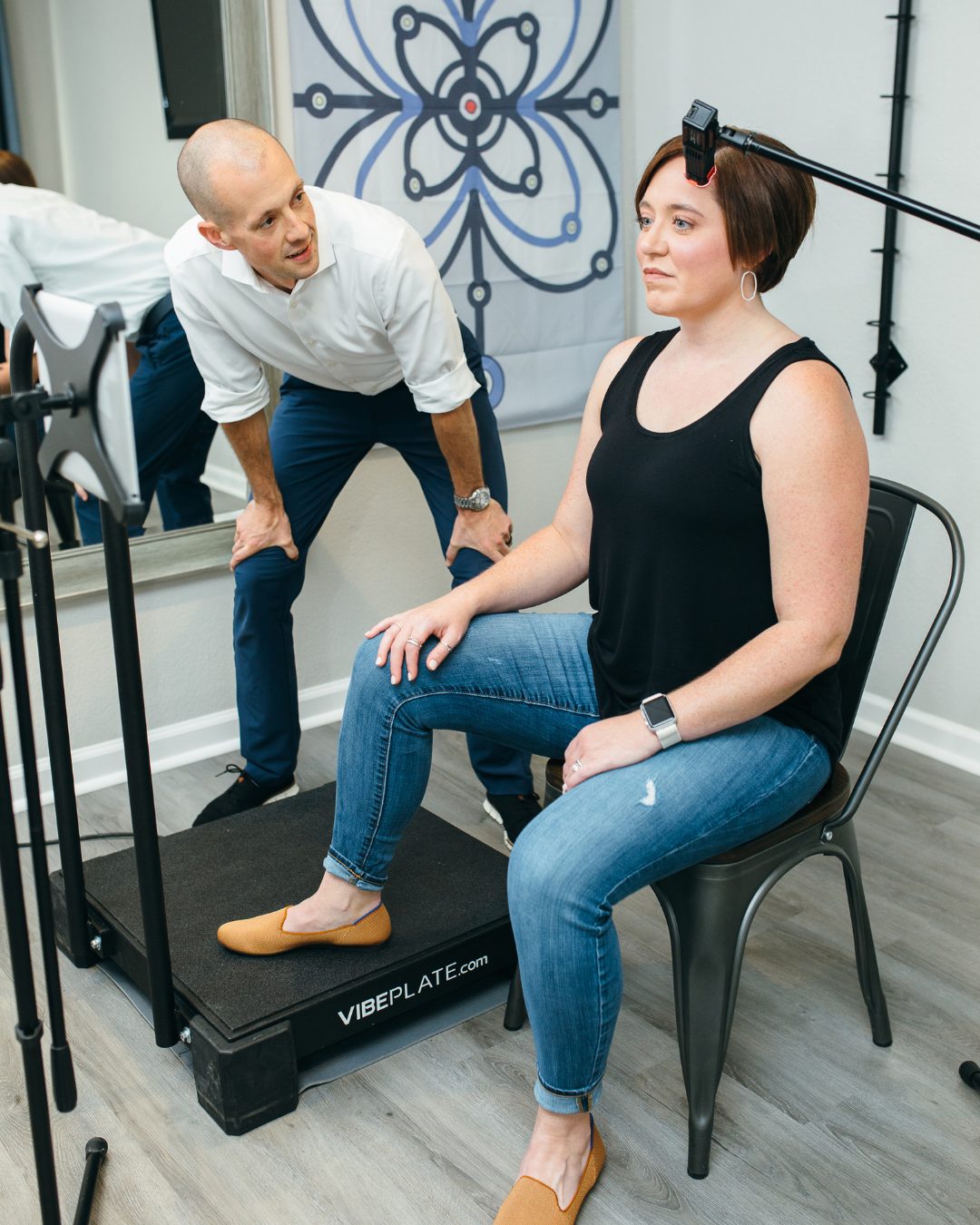 Woman receiving Dizziness treatment at a chiropractic clinic in mansfield, texas